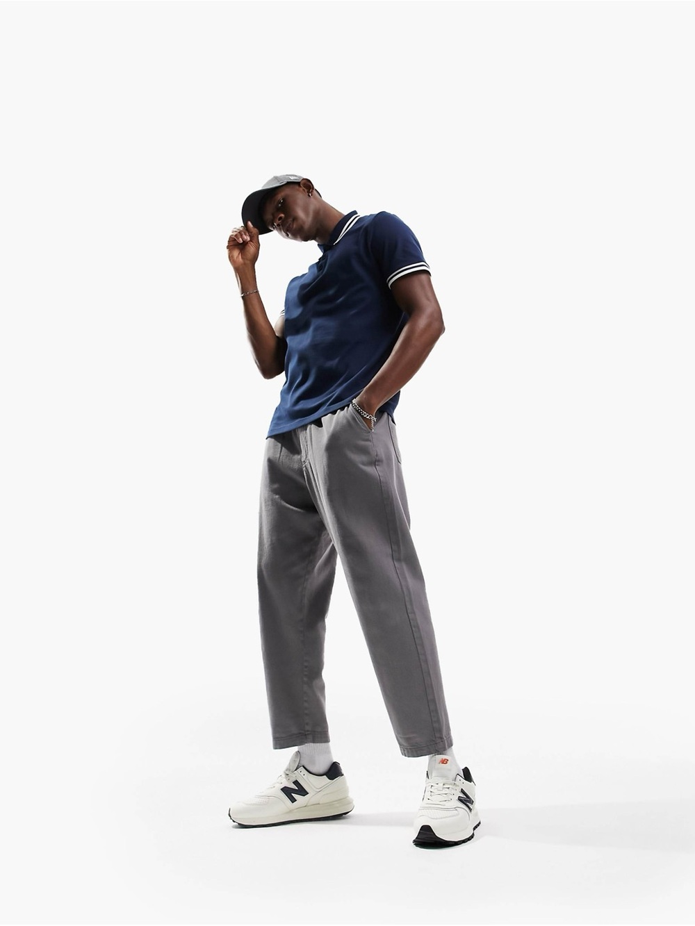 ASOS DESIGN tipped pique polo shirt in navy.